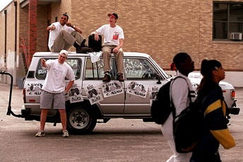Hillcrest High School junior Matt Wilson  (standing) campaigns with Colin Allred (left) 