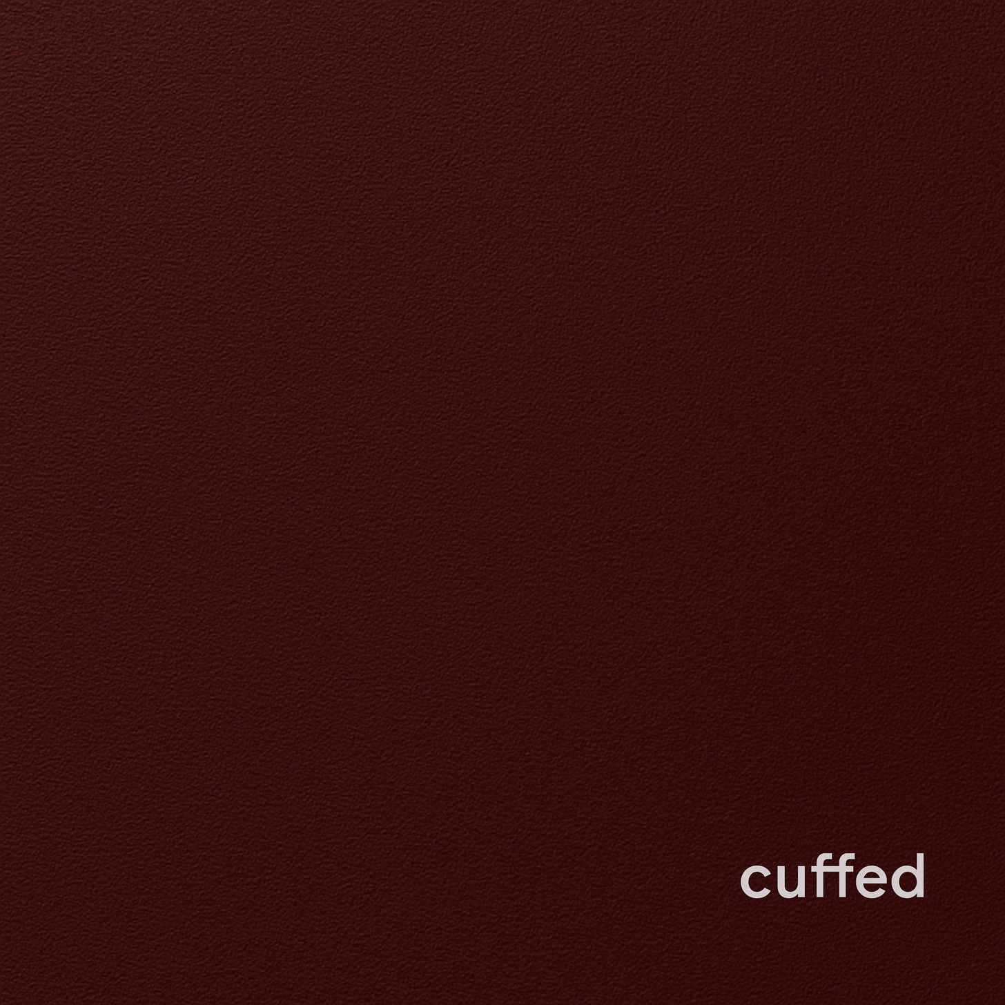 deep matte wine-red square with subtle pebbled grain texture, luxury leather aesthetic. lowercase serif wordmark “cuffed” in beige, anchored bottom-right. minimalist, editorial design with restrained mood of trust, taboo, and confrontation. seo tags: red room cover art, cuffed brand, masculine intimacy, luxury leather texture, premium minimalism.