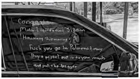 Text on windows of suspect's vehicle