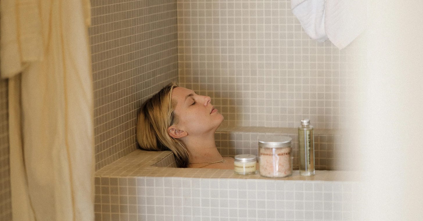 Woman relaxing in a bath