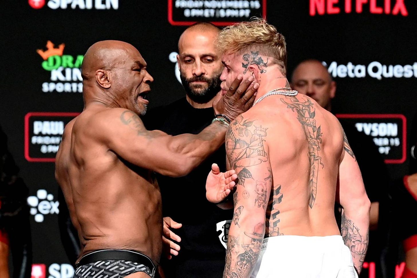 Mike Tyson Smacks Jake Paul in the Face in Wild Staredown
