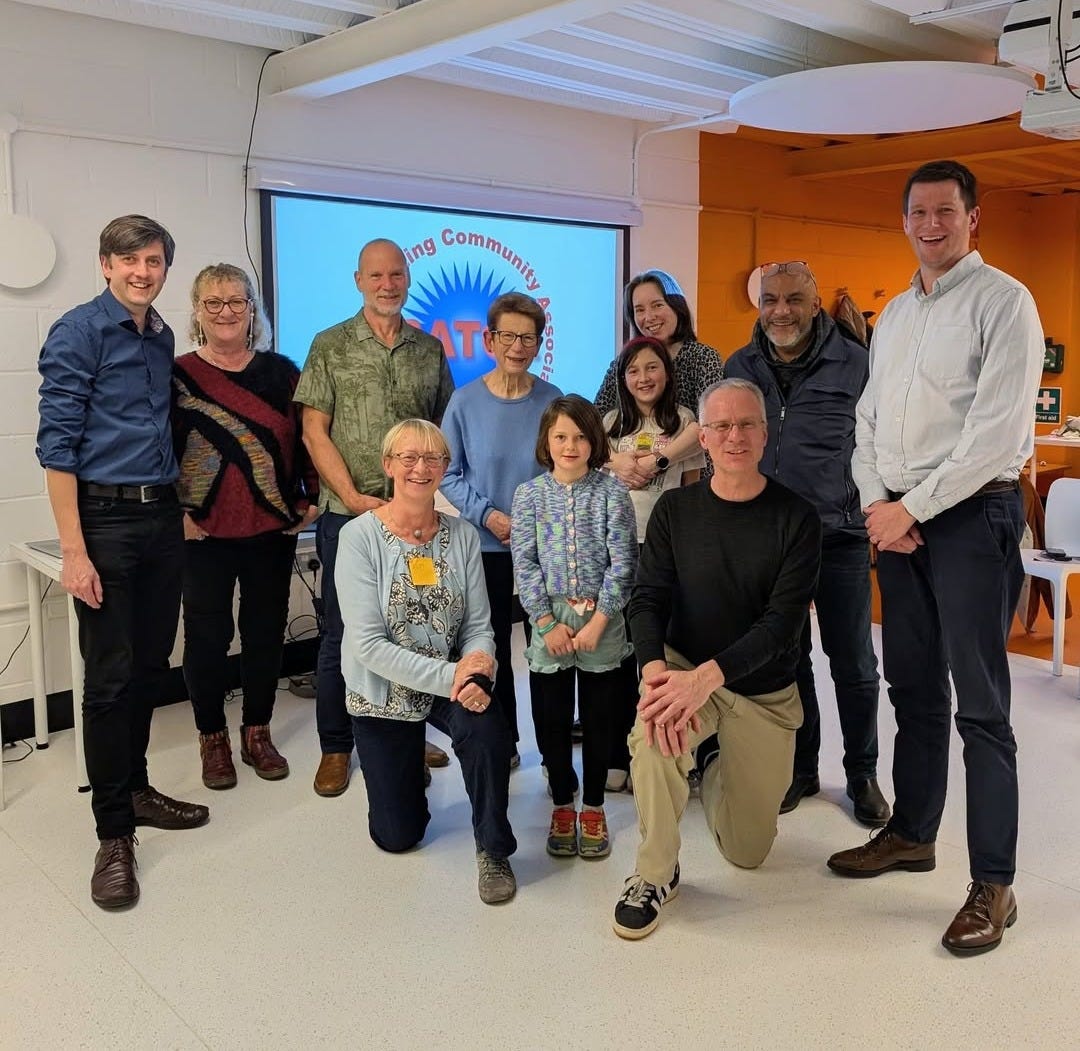 May be an image of one or more people and text