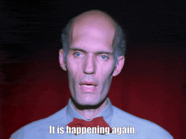 a bald man with a red bow tie says " it is happening again "