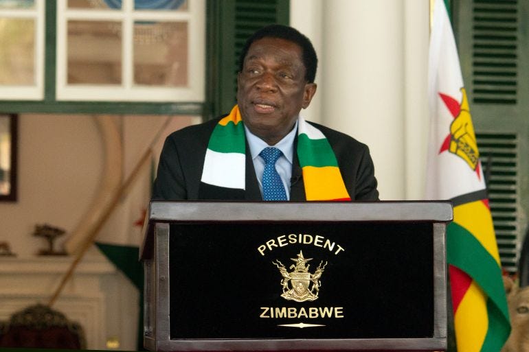 Zimbabwean President Emmerson Mnangagwa speaking after his reelection. He is standing at a lectern in the presidential palace Zimbabwean President Emmerson Mnangagwa speaking after his reelection. He is standing at a lectern in the presidential palace