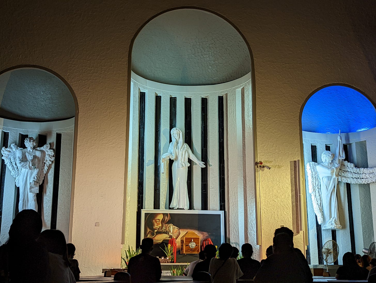 A close-up of the altar of repose of Jesus the Divine Word Church showing the three statues near it