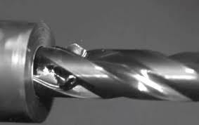 Photo of metal boring into metal. Photo of metal boring into metal.