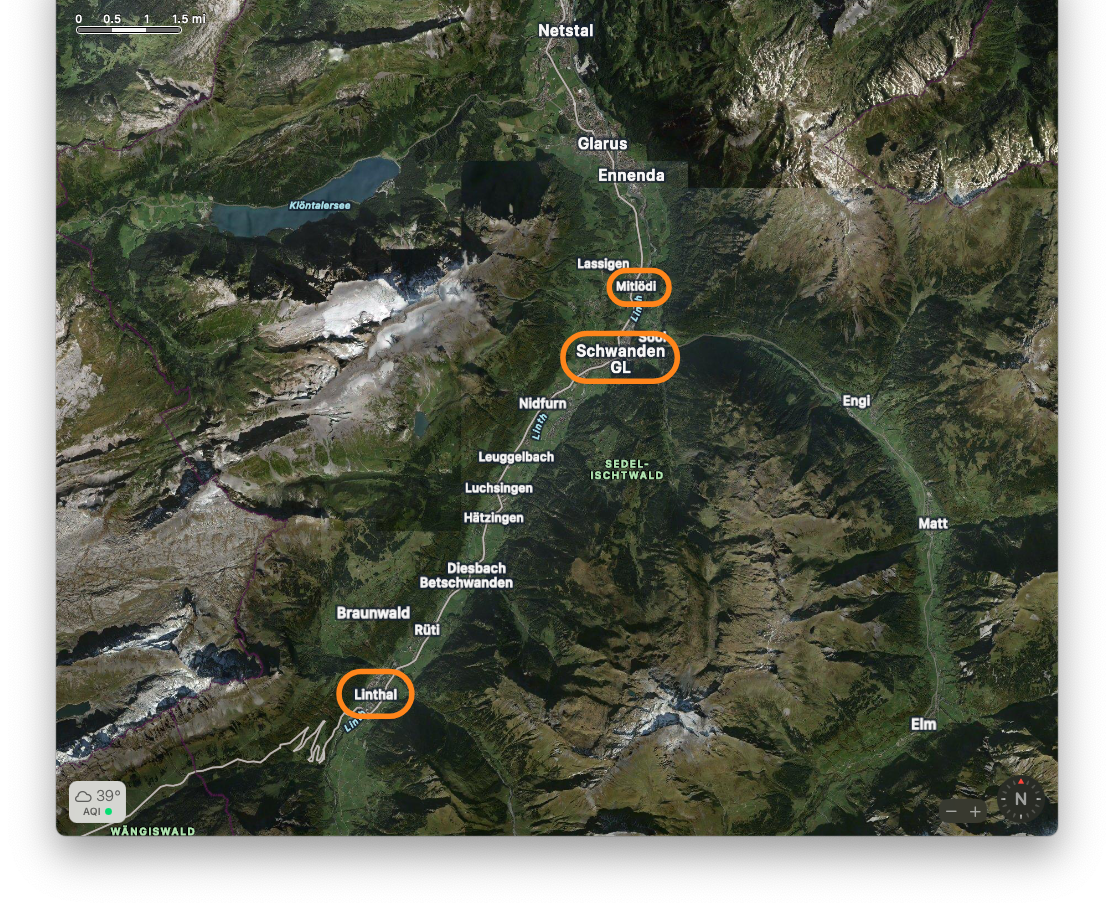 Screenshot from Apple Maps showing the Linth River valley in Glarus, Switzerland. Three towns of Linthal, Schwanden, and Mitlödi are highlighted.