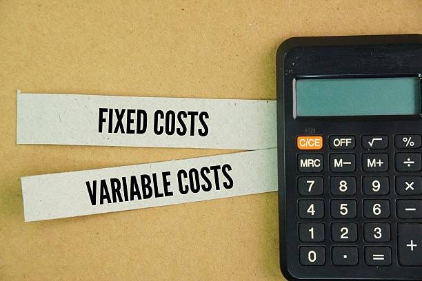 Calculator and paper with the words fixed costs and variable costs. Calculator and paper with the words fixed costs and variable costs. The two main types of costs for control. Cost control is the process of identifying, eliminating Fixed and Variable Costs stock pictures, royalty-free photos & images Calculator and paper with the words fixed costs and variable costs. Calculator and paper with the words fixed costs and variable costs. The two main types of costs for control. Cost control is the process of identifying, eliminating Fixed and Variable Costs stock pictures, royalty-free photos & images