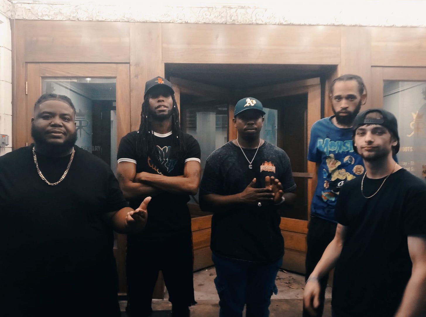 May be an image of 4 people and people standing