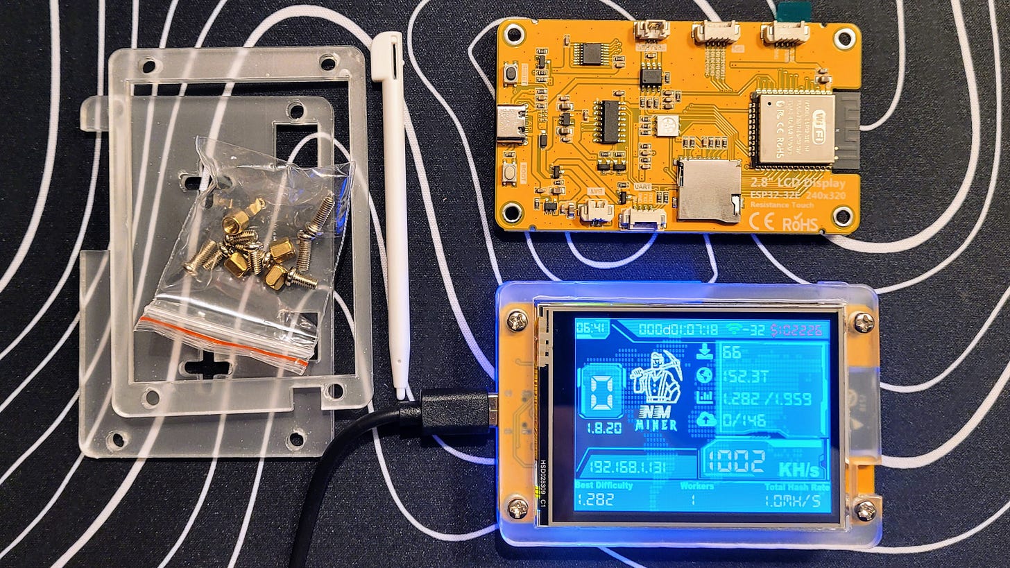 The kit and an assembled, operating miner The kit and an assembled, operating miner