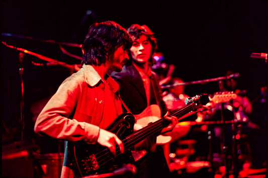 Rick with his bass, as Robbie looks on, Academy of Music, 1971