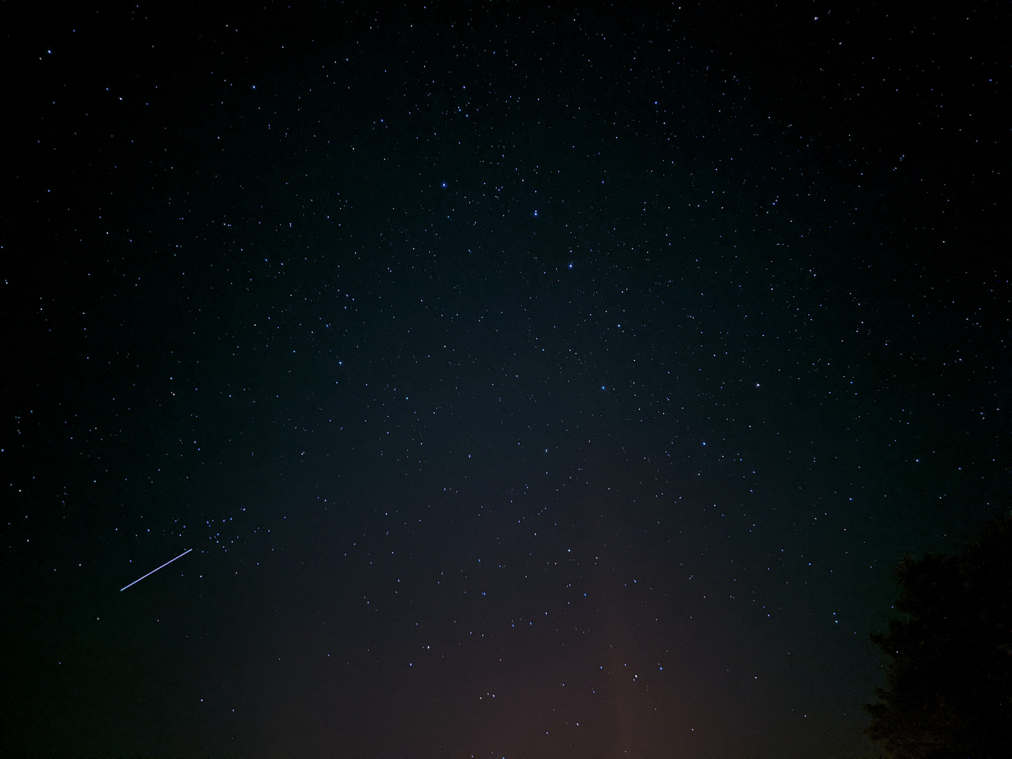 A starry night. A think white streak of light in the left corner is the International Space Station, captured through a time-lapse photo in northern Michigan. July 16, 2020. A starry night. A think white streak of light in the left corner is the International Space Station, captured through a time-lapse photo in northern Michigan. July 16, 2020.
