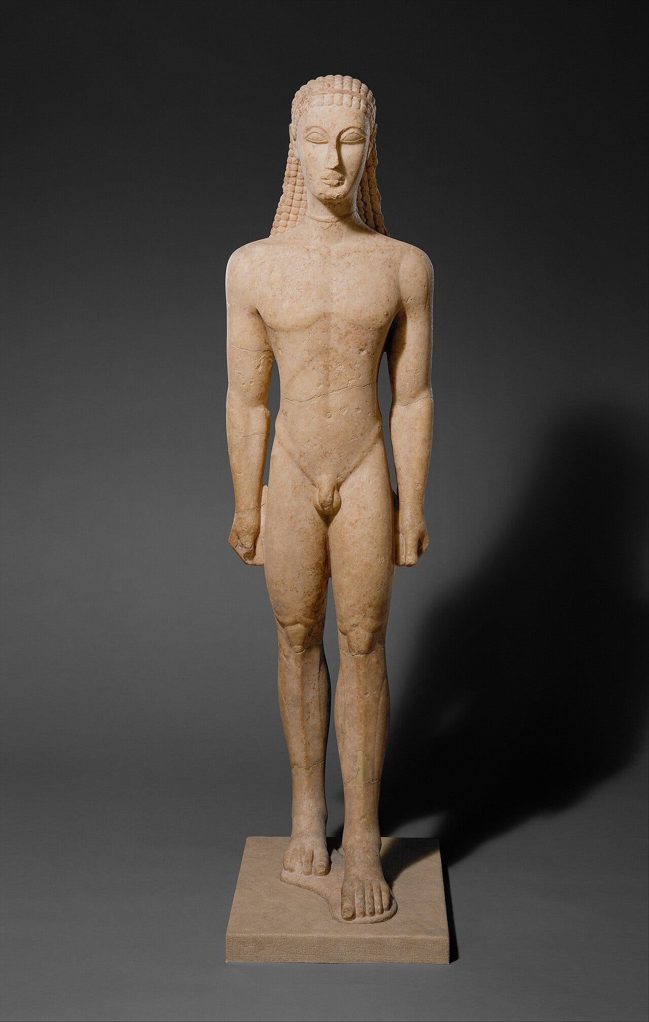 Archaic Greek kouros rigid frontal pose Archaic Greek kouros rigid frontal pose