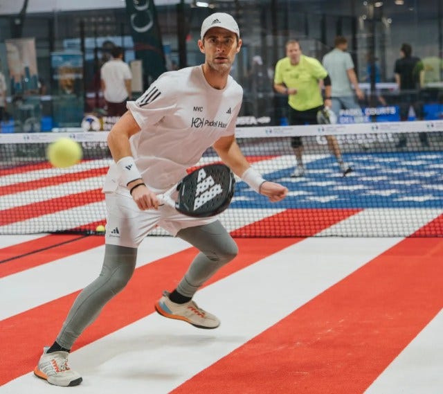 Padel player on U.S. flag court