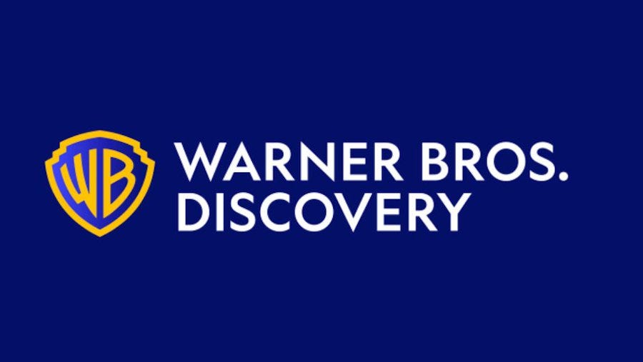 Blue background with yellow shield-shaped WB logo on left and white text Warner Bros. Discovery below it representing the company branding
