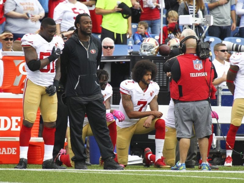 colin kaepernick kneels for anthem 49ers vs bills colin kaepernick kneels for anthem 49ers vs bills