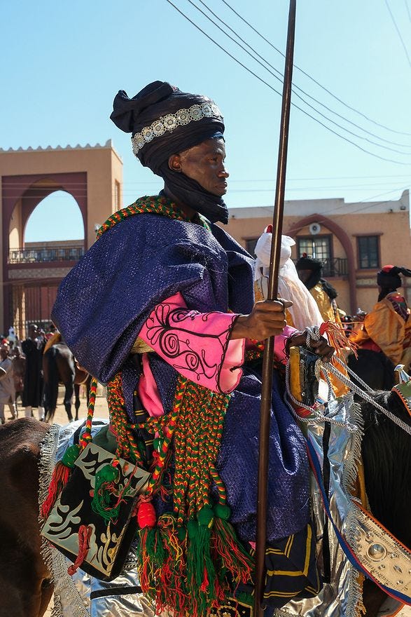 Image may contain Travis Scott Adult Person and Tribe