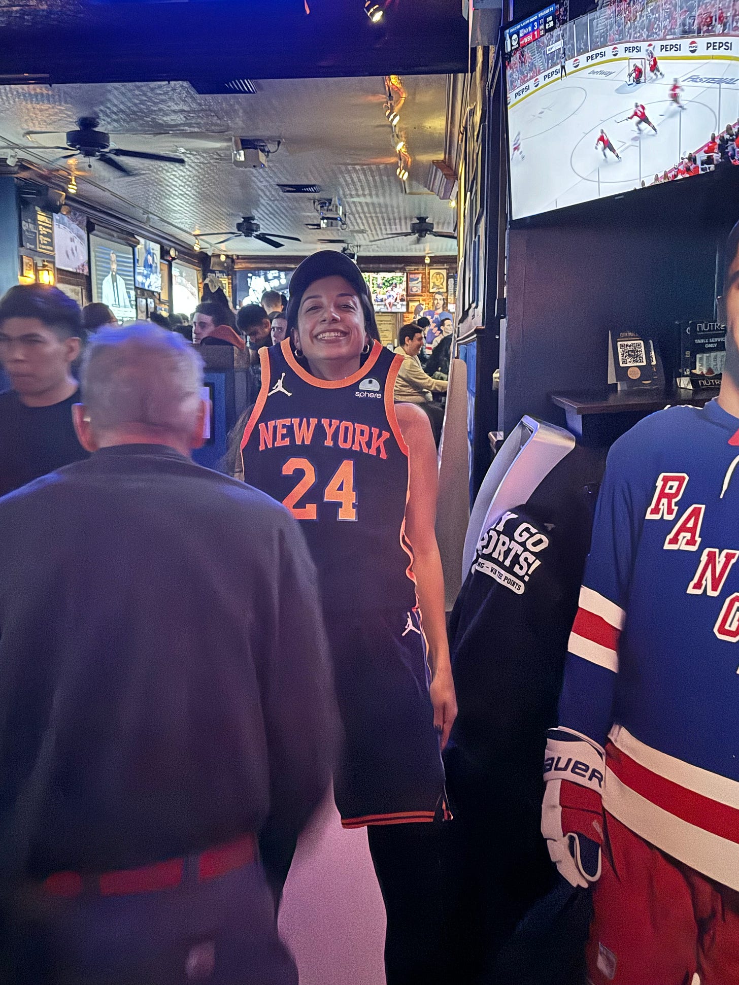 Photo of Katya with jersey that says 24