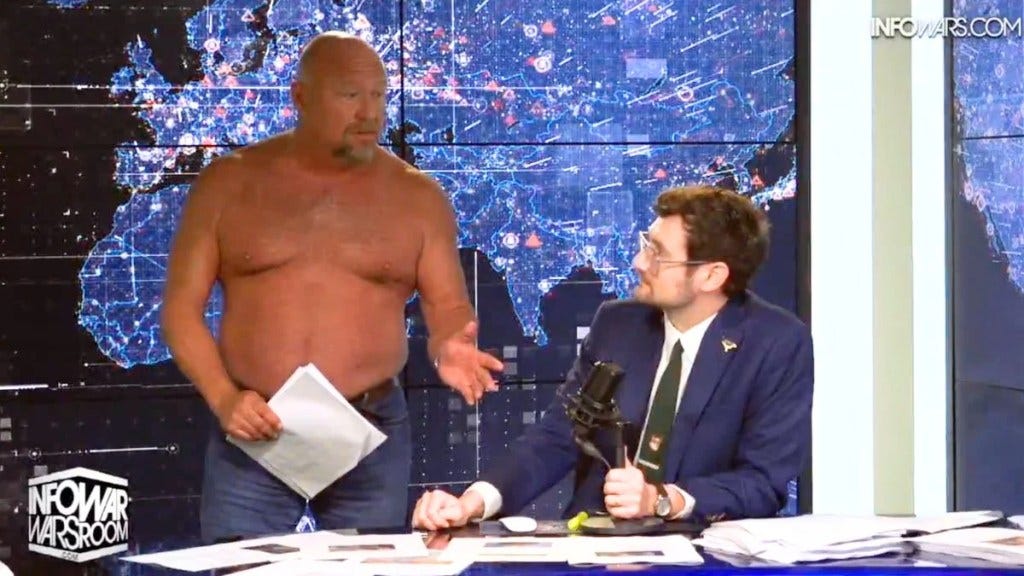 Alex Jones Goes Topless During On-Air Meltdown Over The Onion's InfoWars  Purchase: 'Keep Laughing' | Video