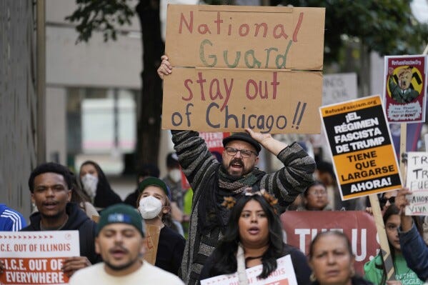 People march during Illinois Coalition for Immigrant & Refugee Rights' "Chicago Says No Trump No Troops" protest Saturday, Sept. 6, 2025, in Chicago. (AP Photo/Carolyn Kaster)