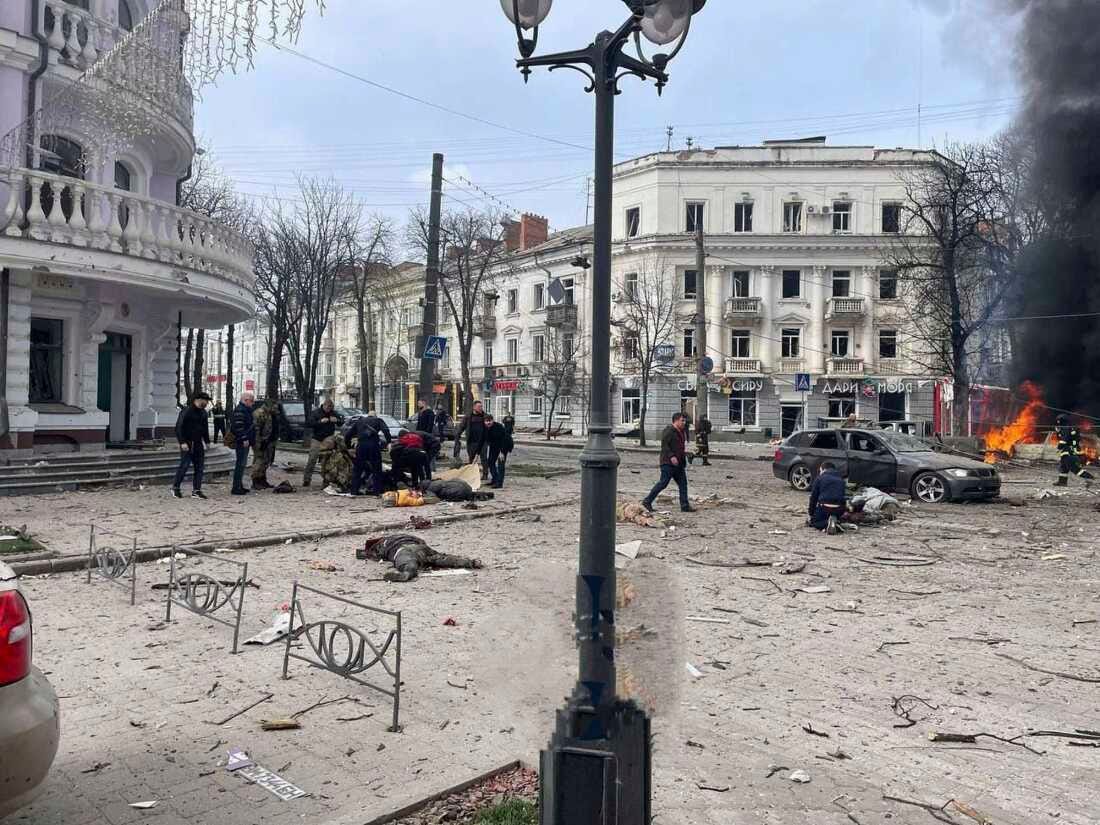 In this photo provided by the Ukrainian Parliament Commissioner for Human Rights Press Service, bodies of the killed residents lie on the ground following a Russia's missile attack that killed at least 20 civilians in Sumy, Ukraine, Sunday, April 13, 2025. (Ukrainian Parliament Commissioner for Human Rights Press Service via AP)