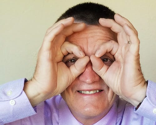 man holds hands to face illustrating customer eyeglasses man holds hands to face illustrating customer eyeglasses