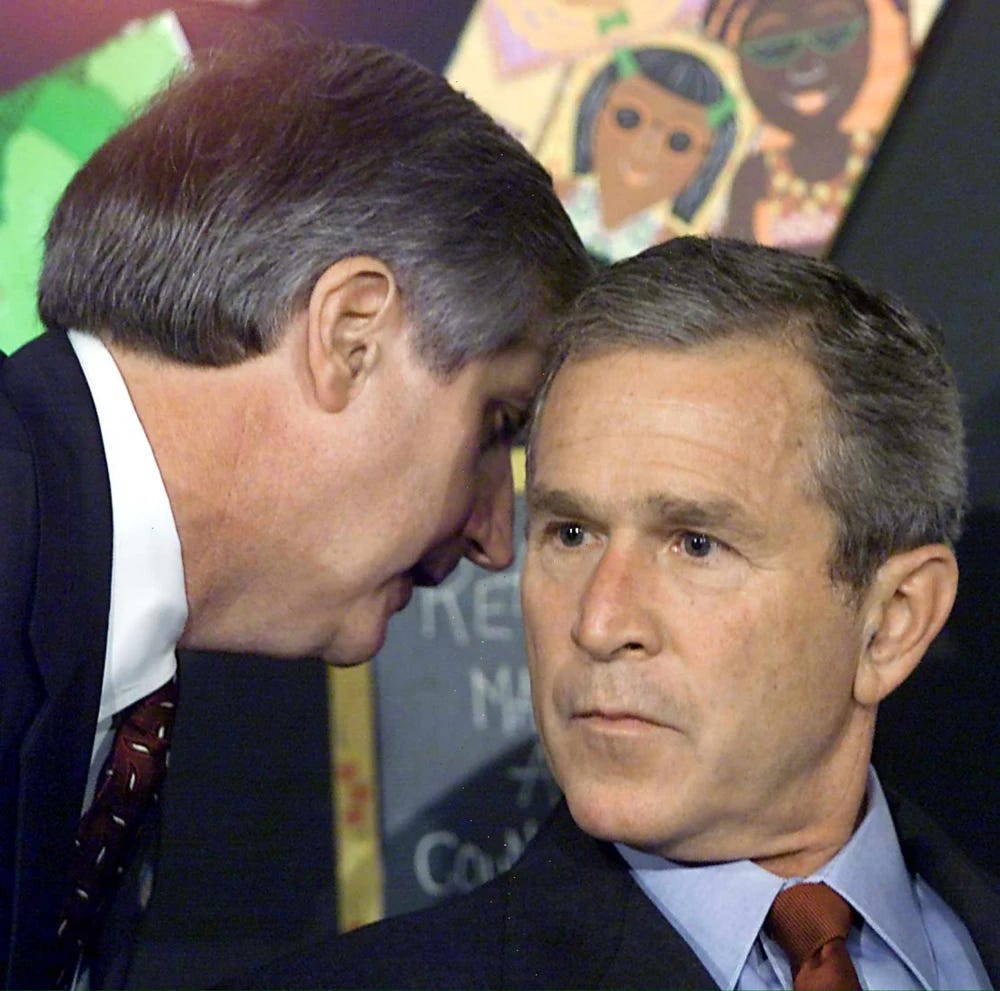 That famous picture of Andrew Card whispering to George W. Bush while he was reading to children.