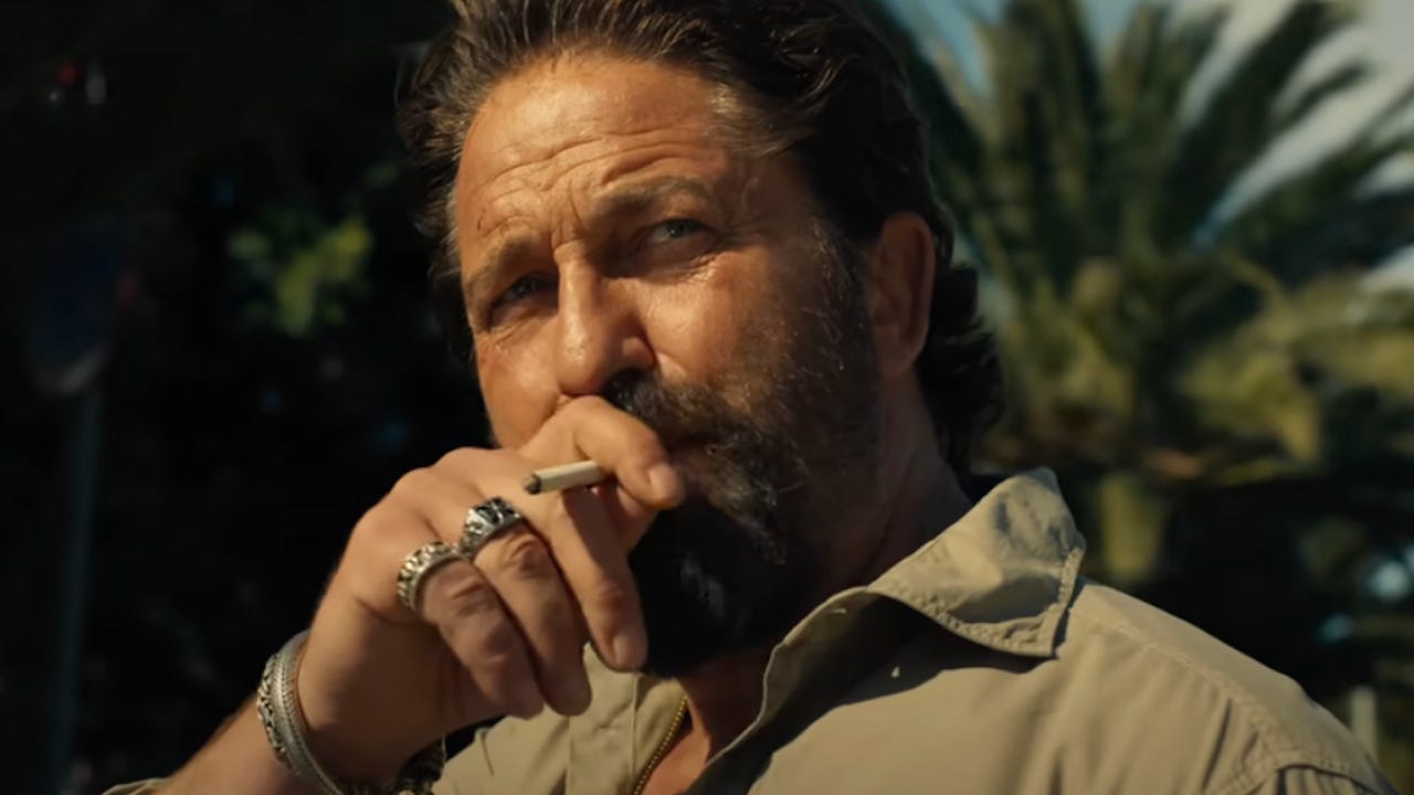Gerard Butler's Den Of Thieves Character Smokes Cigarettes In A Weird Way,  But The Director Tells Us The Valid Reason Behind It | Cinemablend