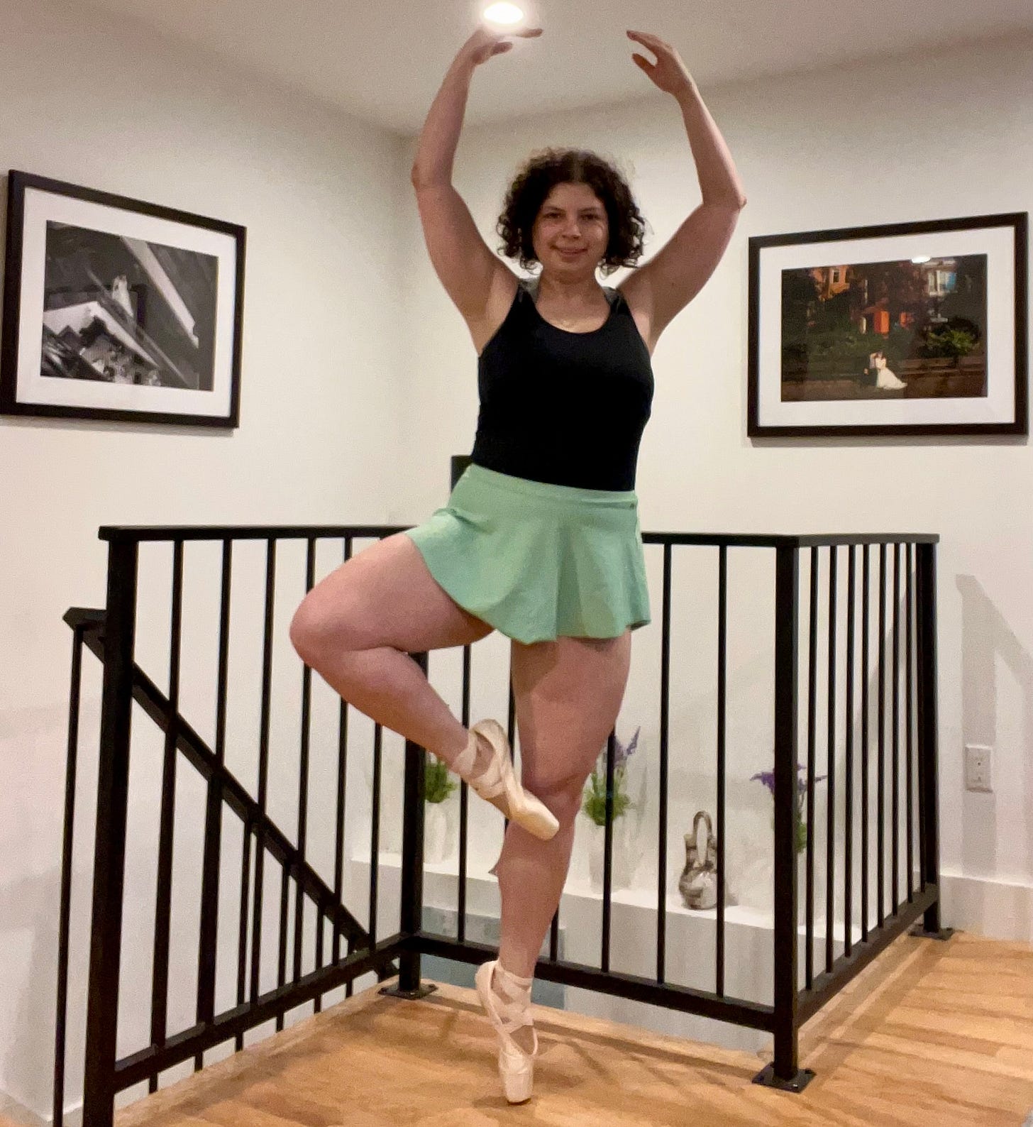 A ballet dancer doing a posse en pointe