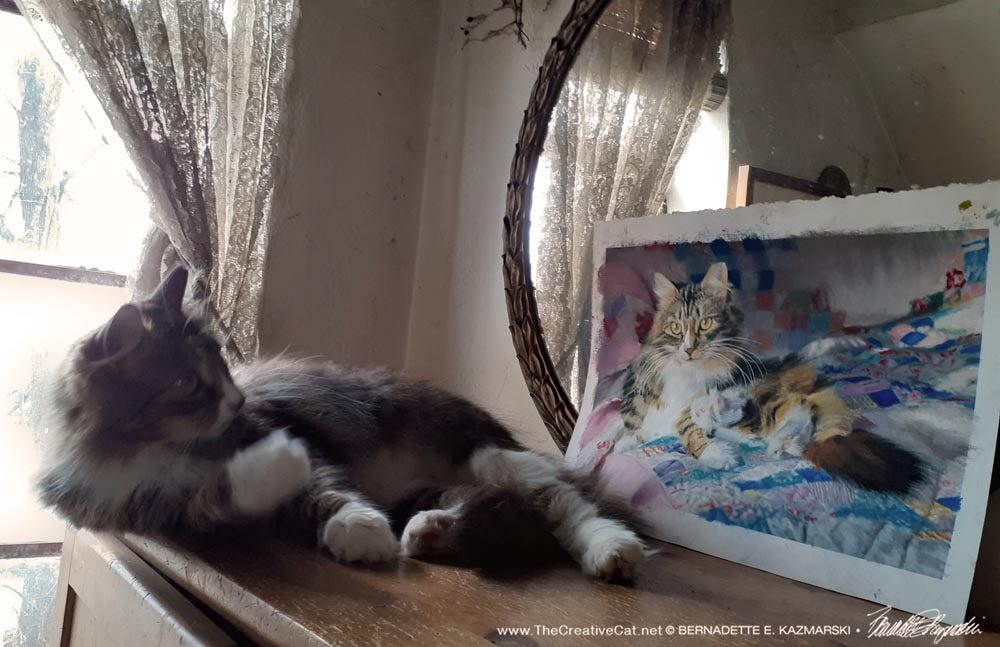 Mariposa looks at her painting