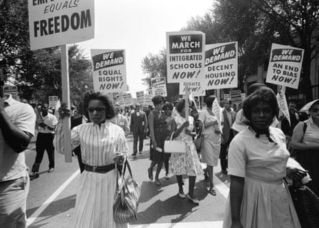 people holding signs people holding signs