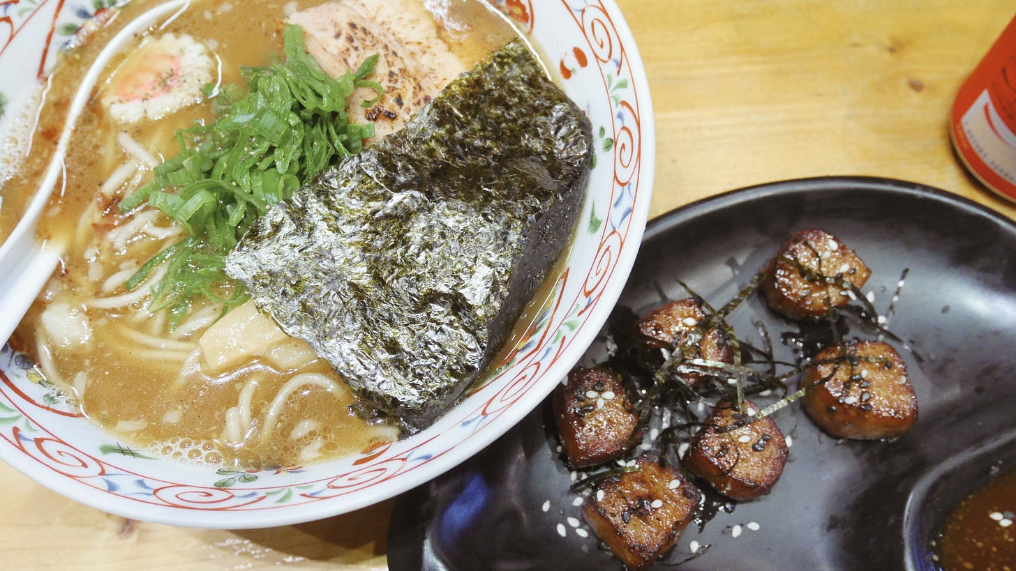 Bowl of ramen and plate of wagyu