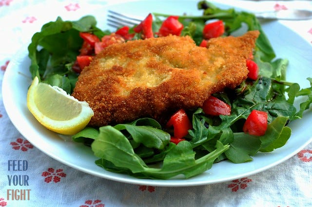 Chicken Milanese over a bed of fresh arugula with tomato by Eve Fox, Garden of Eating blog, copyright 2012