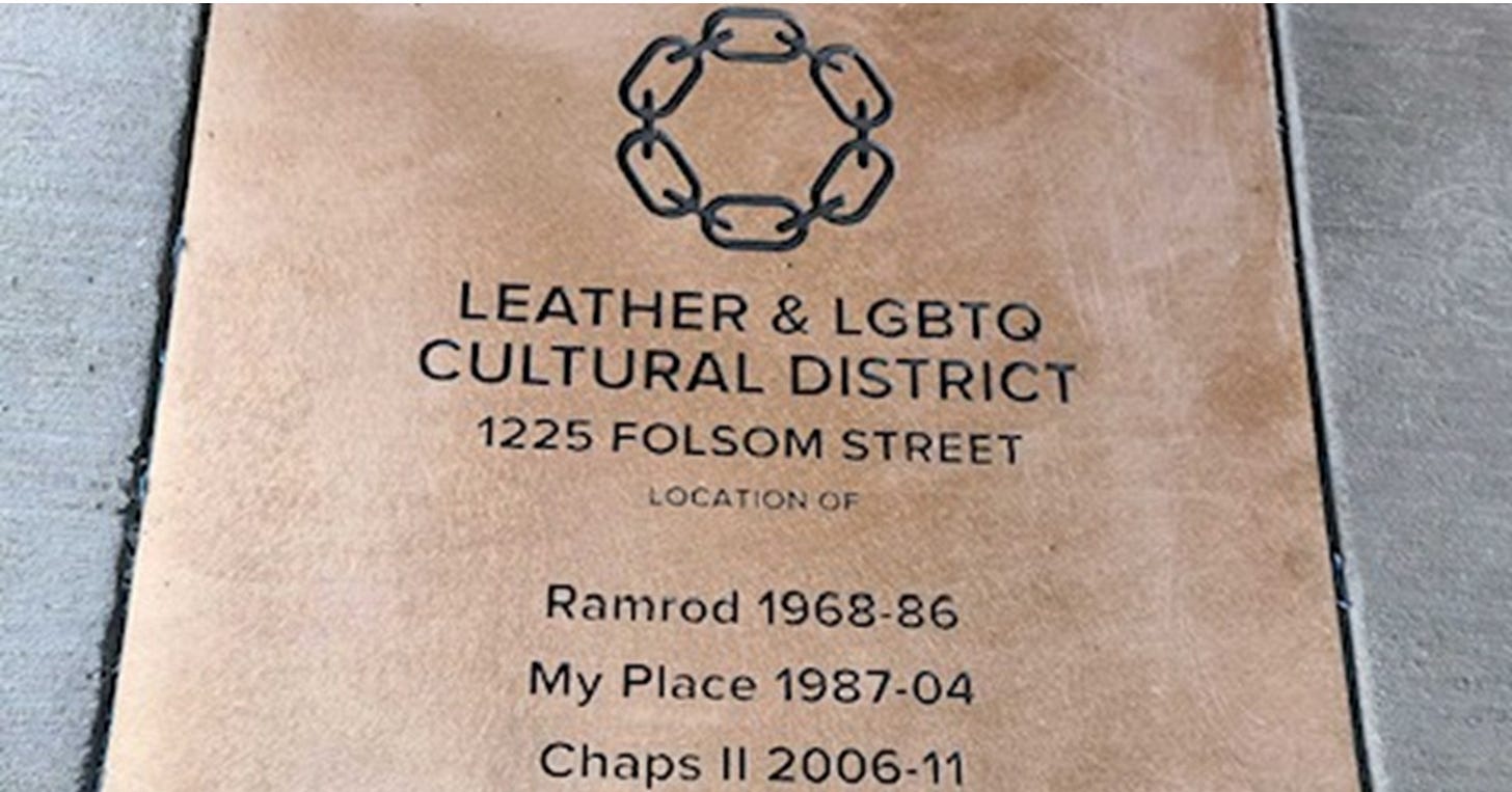 May be an image of leather, leather wallet, saddle-stitched leather and text that says 'LEATHER & LGBTQ CULTURAL CULTURALDISTRIC DISTRICT 1225 FOLSOM STREET LOCATION OF Ramrod 1968-86 My Place 1987-04 Chaps II 2006-11'