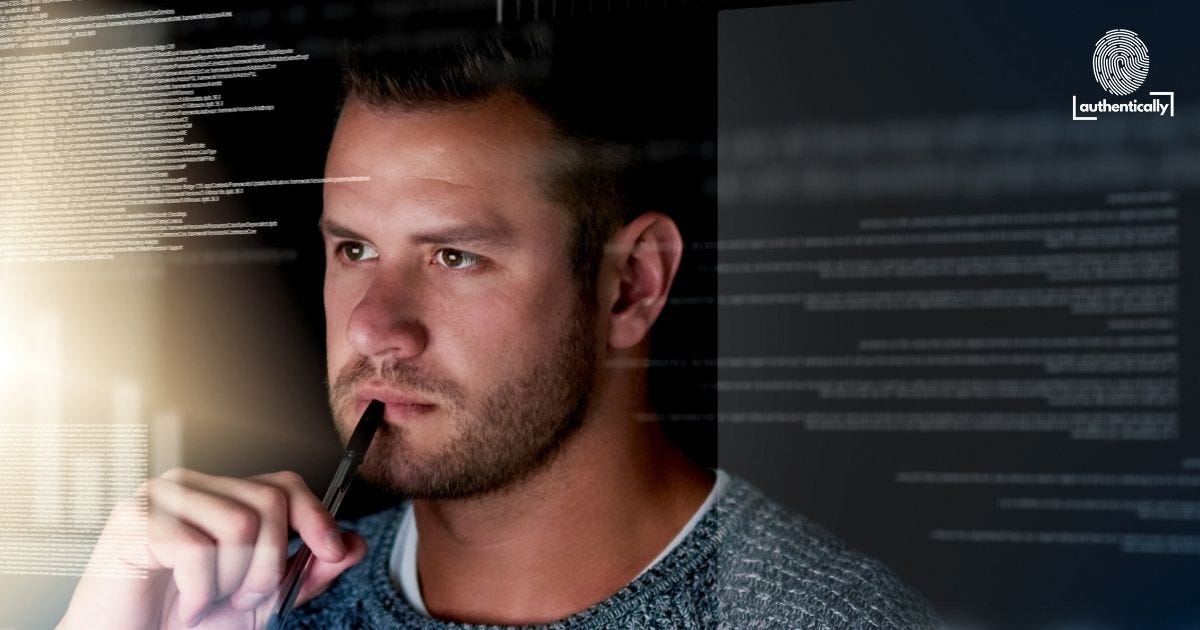 Man looking focused at a screen with code