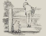 A boy, a bear, & a pig look off the rail of a footbridge