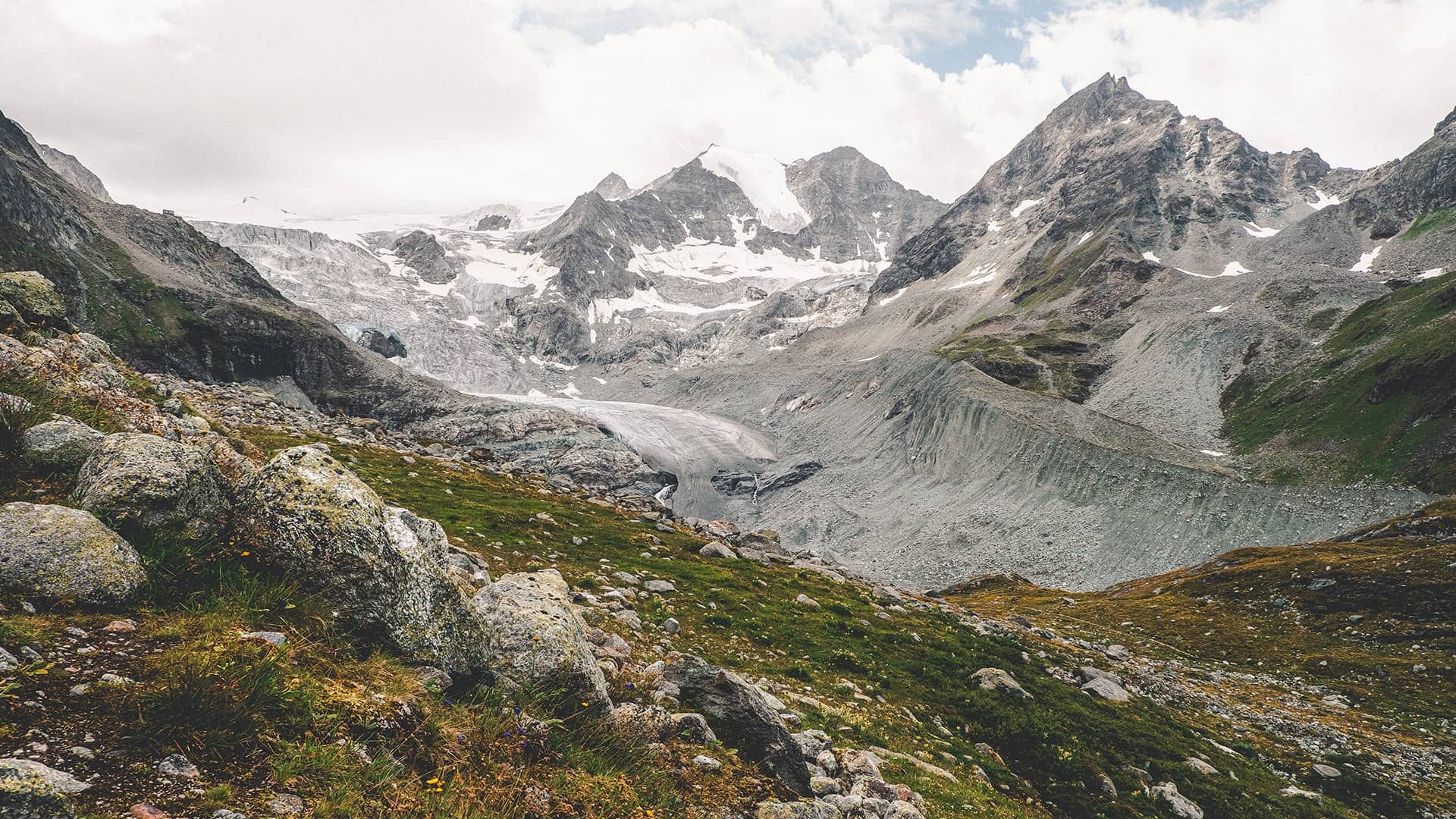 A view of a snowy mountain range. A view of a snowy mountain range.