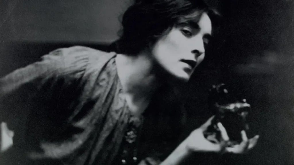 Mina Loy with a Rodin sculpture