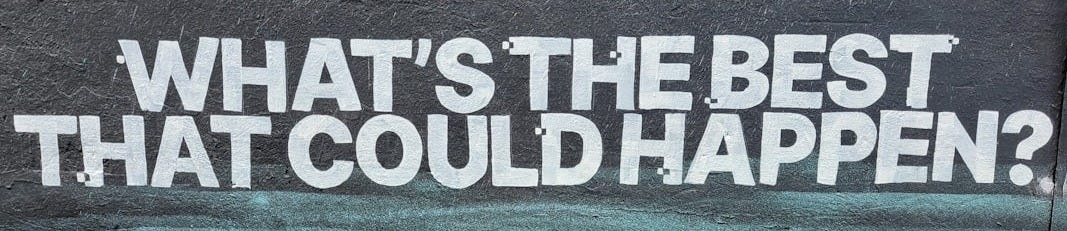a wall with a message painted on it that says, what's the best