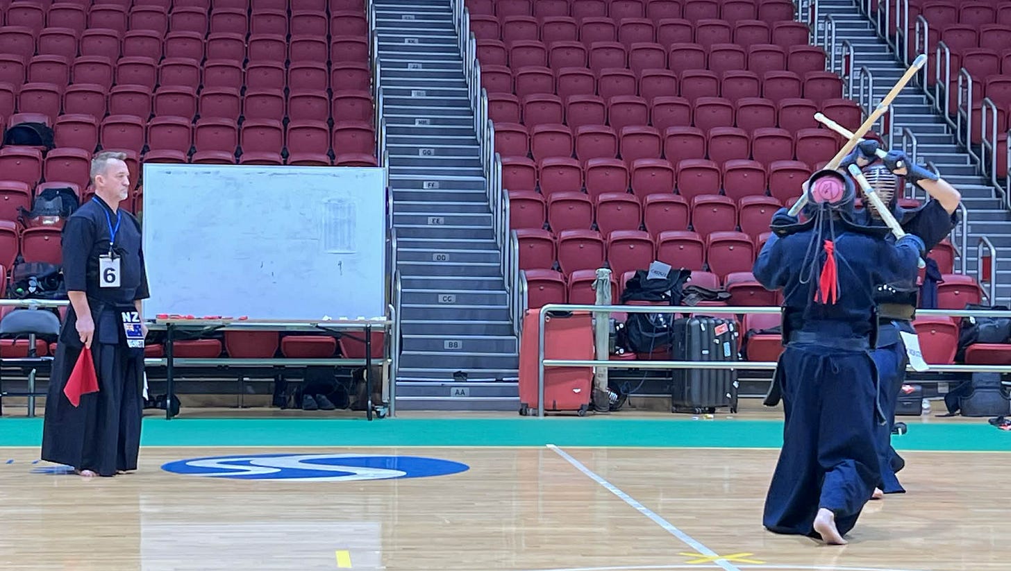 A person standing on a court in front of a red stadium
AI-generated content may be incorrect. A person standing on a court in front of a red stadium
AI-generated content may be incorrect.