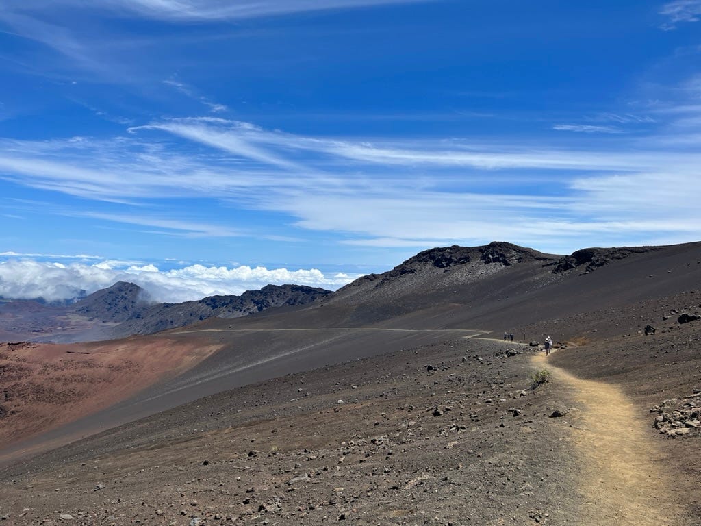 A picture containing outdoor, cloud, ground, mountain

Description automatically generated