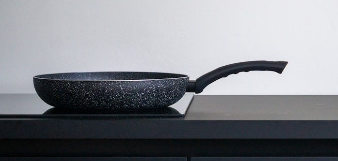 black leather chair on black wooden table black leather chair on black wooden table