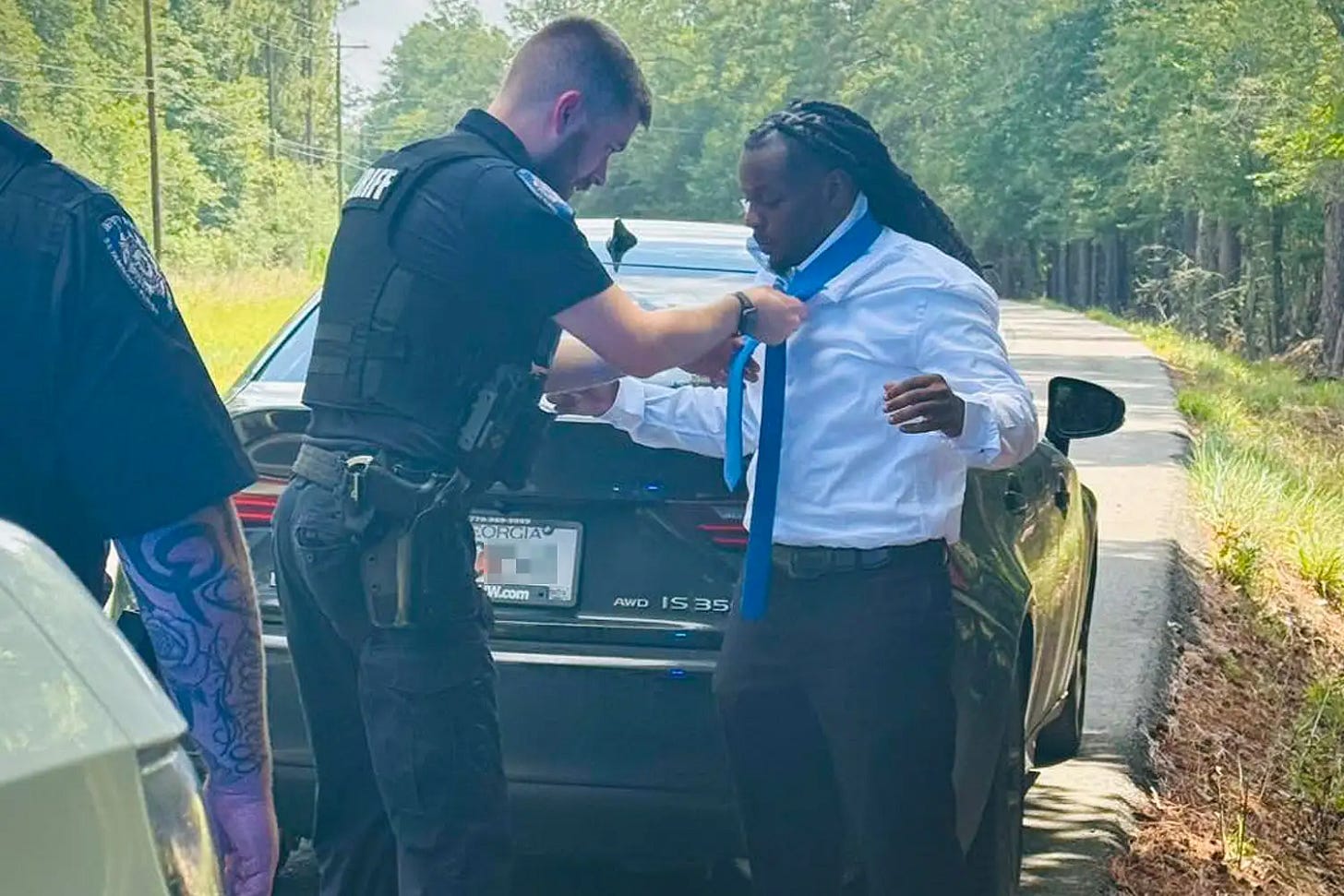 Police Officer Stops Man for Speeding, But Helps Him With His Tie When He Learns He's Going to a Funeral Police Officer Stops Man for Speeding, But Helps Him With His Tie When He Learns He's Going to a Funeral