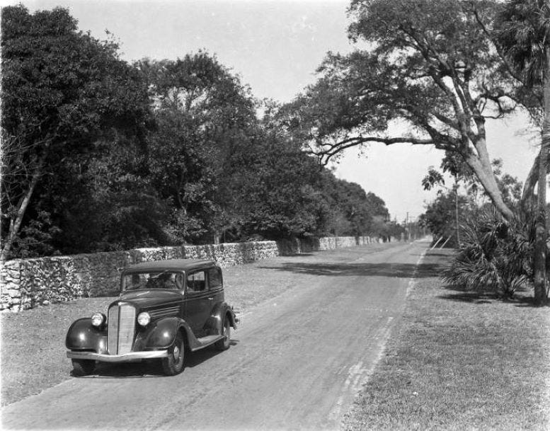 SE 15th Road in the Brickell neighborhood looking west. Simpson Park’s northern wall can be seen to the left. Courtesy of the Miami-Dade Public Library, Romer Collection. SE 15th Road in the Brickell neighborhood looking west. Simpson Park’s northern wall can be seen to the left. Courtesy of the Miami-Dade Public Library, Romer Collection.