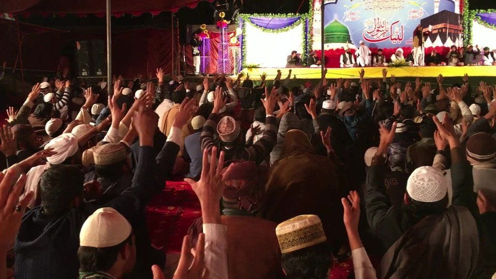 Supporters of Tanveer Ahmed chant slogans in Mirpur