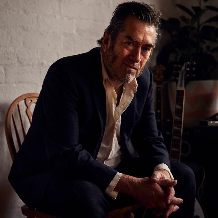 Top Paddock/Mick Thomas logo