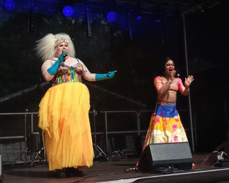 Two performers on stage at Croydon Pride