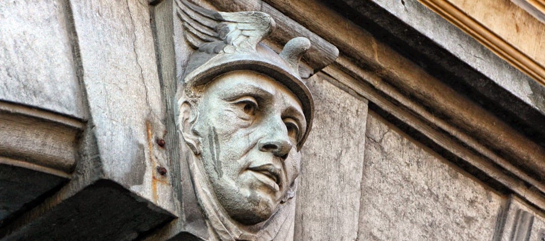 a close up of a face on a building