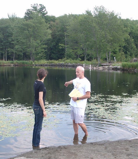 The author being baptized in a lake in summer, 2011.