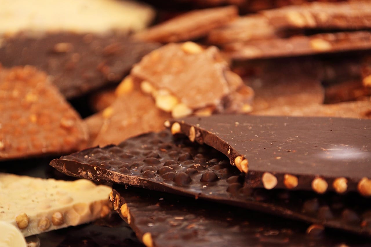 Many pieces of chocolate by Public Domain Pictures via Pixabay